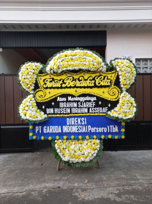 Papan Bunga Duka di Langgeng